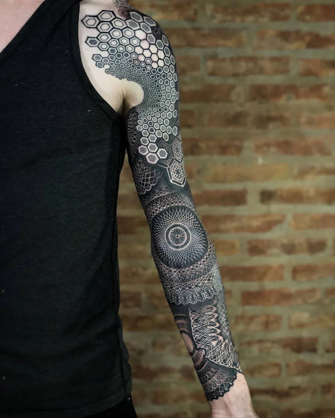 Tattoo artist Eric Stricker, black ornamental large scale tattoo | Buenos Aires, Argentina