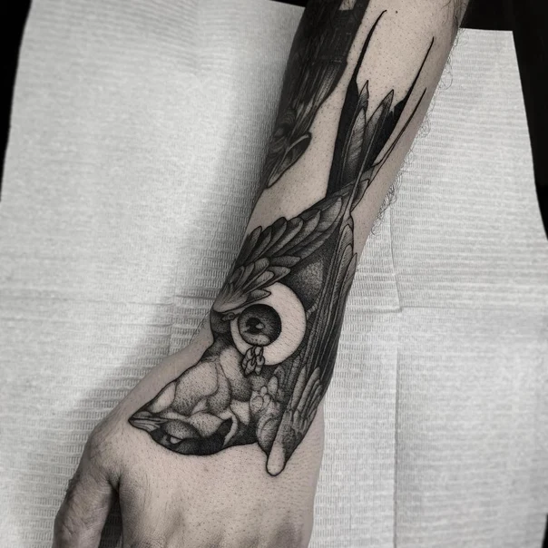 Blackwork Bird, Eye tattoo on Forearm
