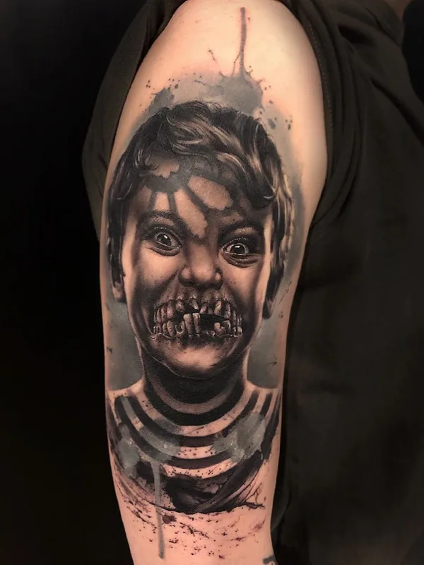 black and grey realism tattoo on upper arm #36430 | Tattoo Artist Alberto Escobar