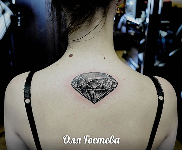 Black & Grey Diamond tattoo on Upper Back