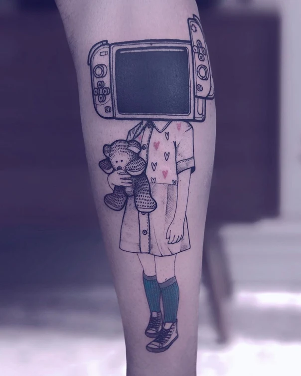 Illustrative Child, Teddy bear tattoo on Calf