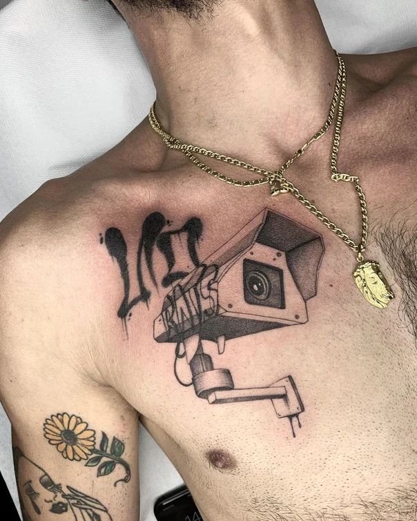 Blackwork Camera, Lettering tattoo on Chest