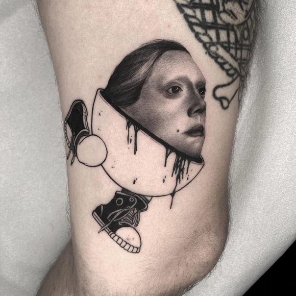 Black & Grey Face, Shoe tattoo on Thigh