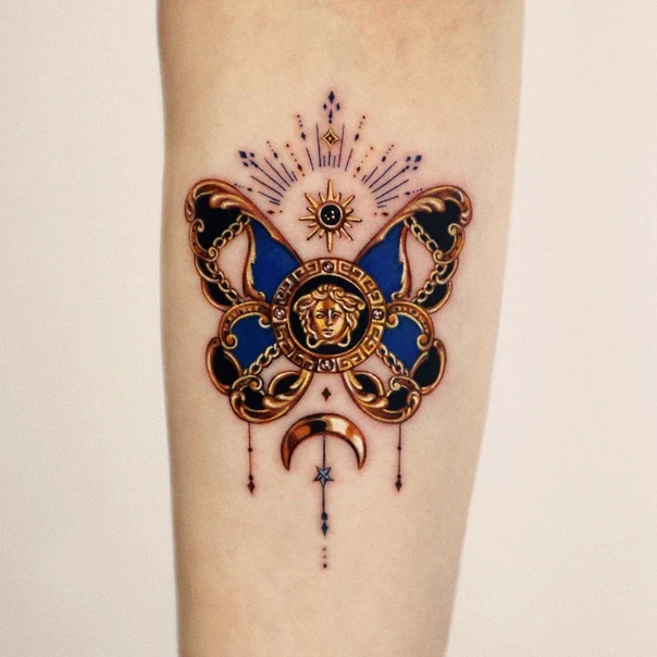 Ornamental Butterfly, Medusa tattoo on Forearm
