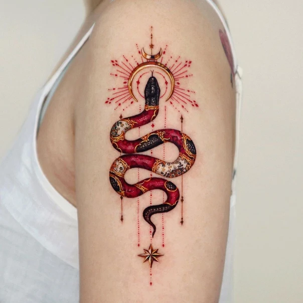Ornamental Snake, Star tattoo on Upper Arm