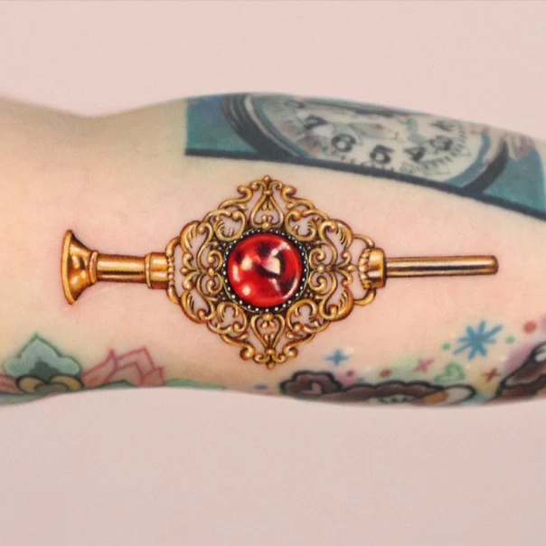 Ornamental Key, Gemstone tattoo on Forearm