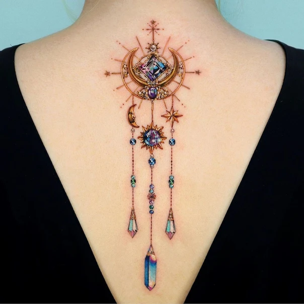 Ornamental Moon, Stars tattoo on Upper Back