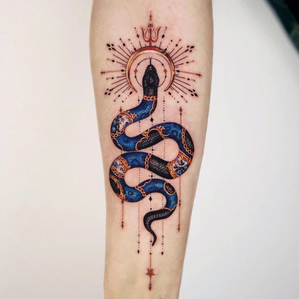 Ornamental Snake, Sun tattoo on Forearm