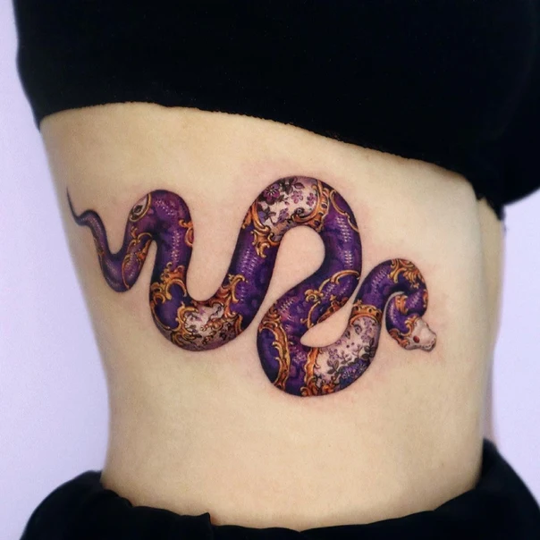 Illustrative Snake, Floral tattoo on Ribcage