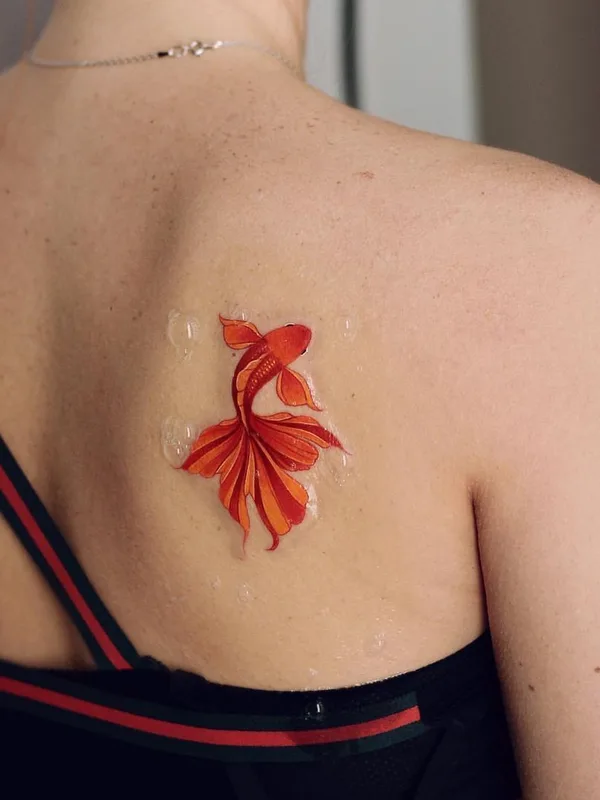female color watercolor tattoo on shoulder blade #41002 | Tattoo Artist Анастасия Слуцкая