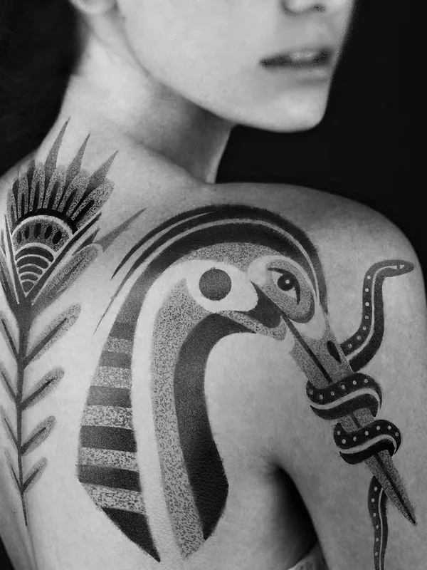 female black and grey geometric tattoo on shoulder blade #41028 | Tattoo Artist Mariñe Perez