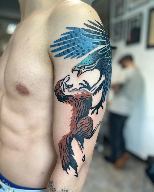 Illustrative Eagle, Wolf tattoo on Upper Arm