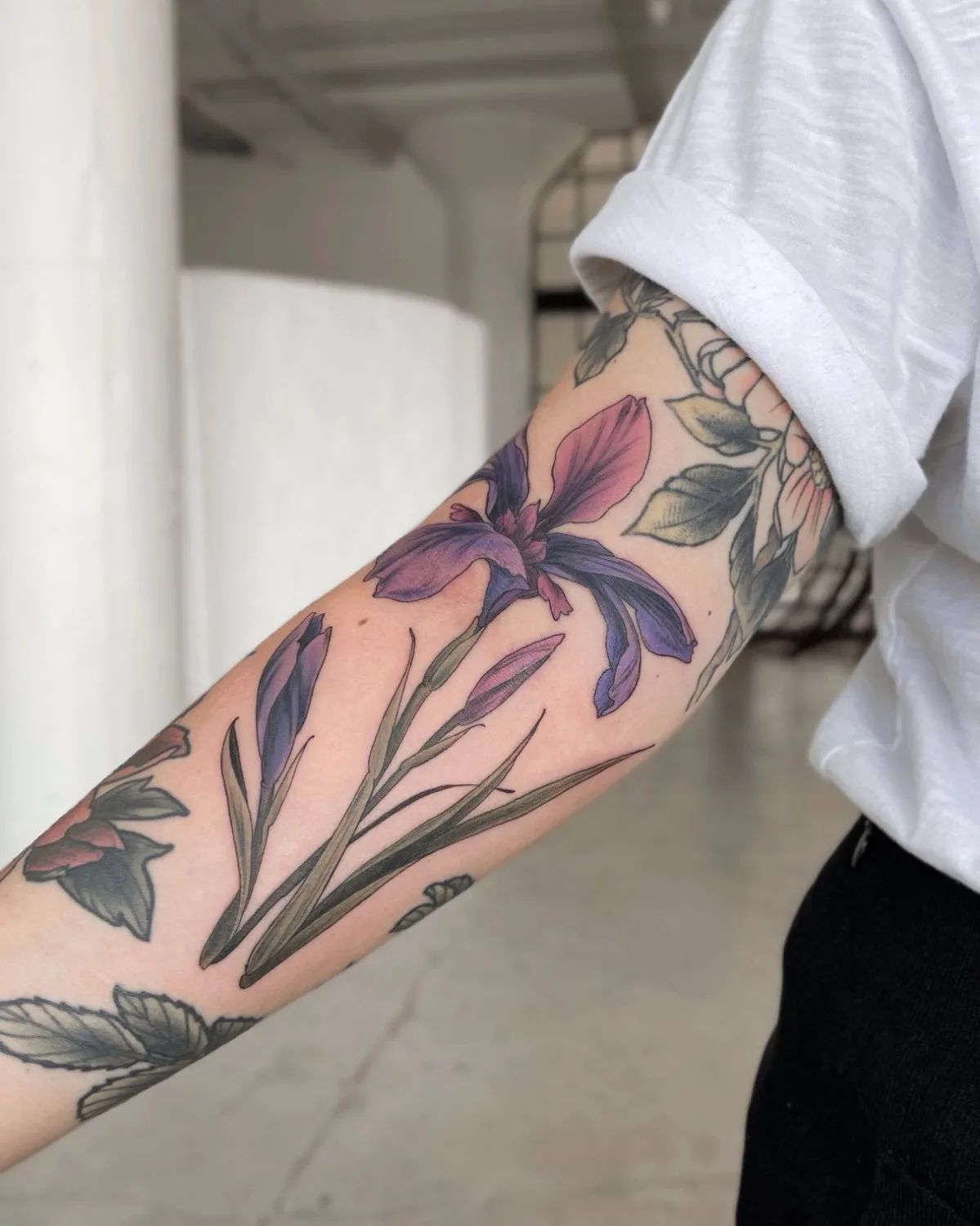 Tatuura de iris na mão de Olga Nekrasova
