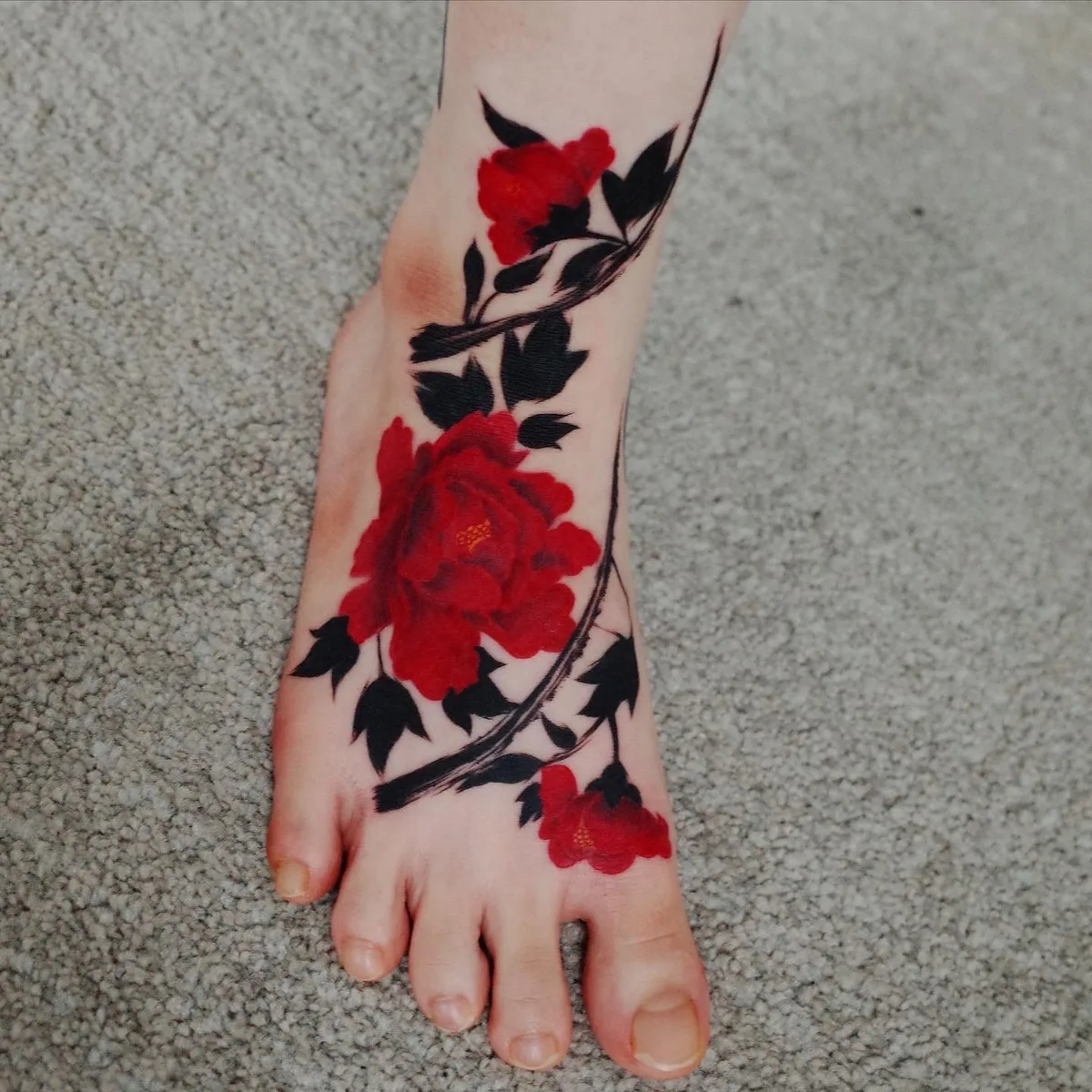 chinese style tattoo on leg