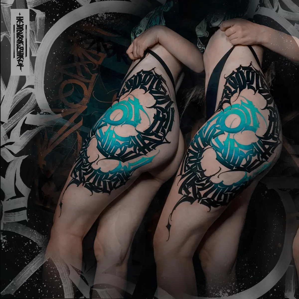 Lettering tattoo on the thigh of a girl - artist Igor Klimin