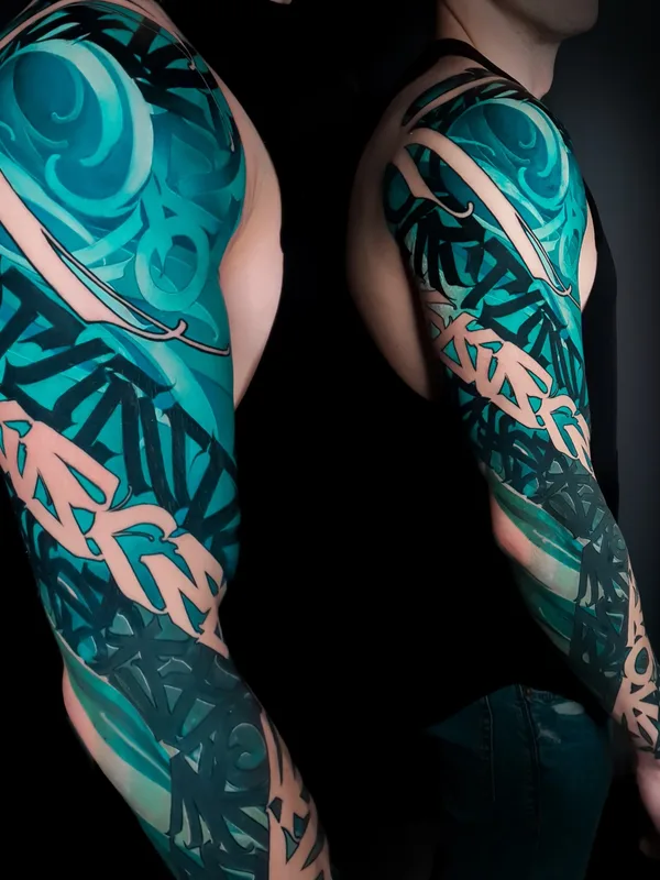 male color lettering tattoo on sleeve #55700 | Tattoo Artist Игорь Климин