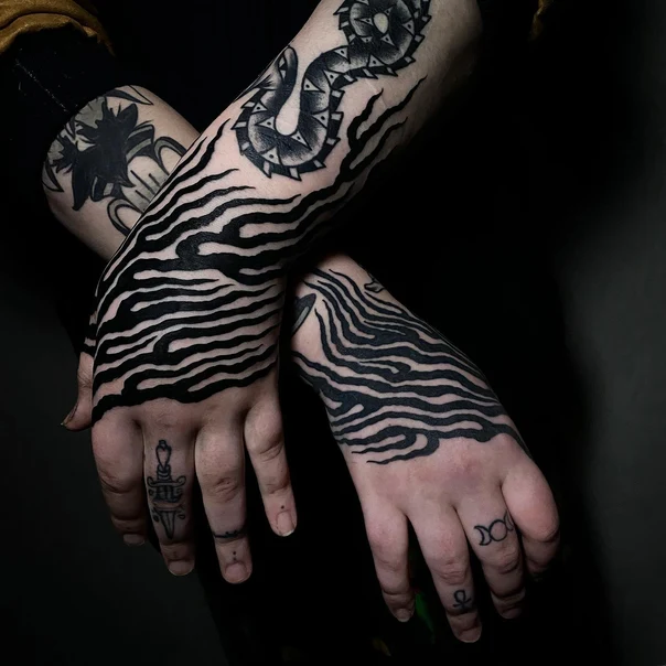 Blackwork Zebra stripes, Snake tattoo on Hand