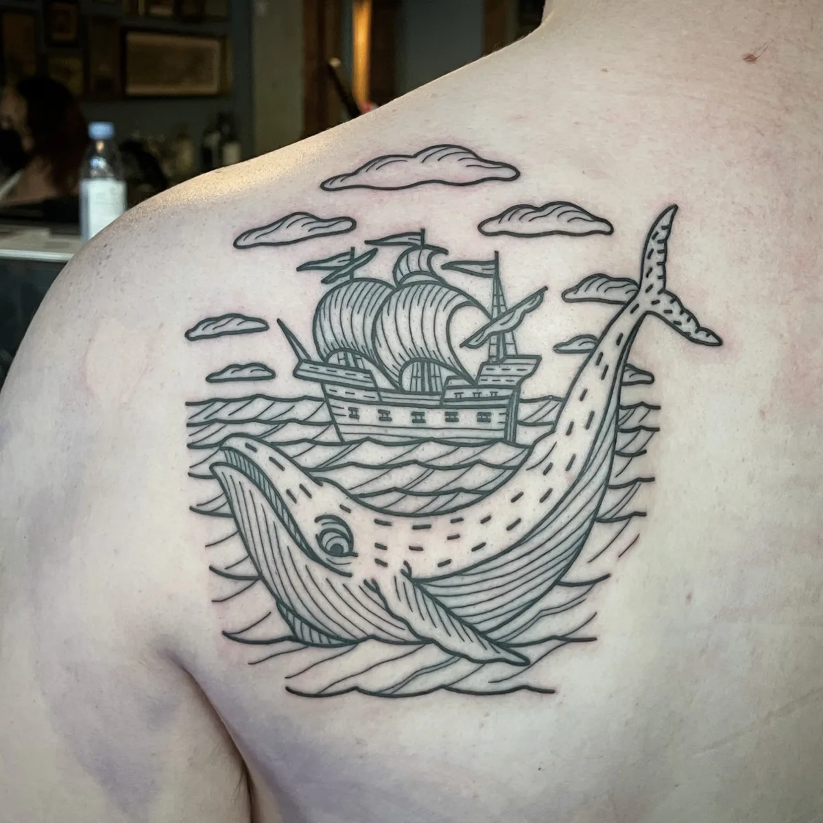 Tattoo artist in Brooklyn whale tattoo