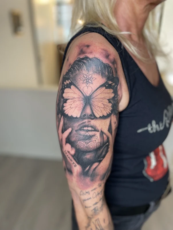 Realism Butterfly, Portrait tattoo on Upper Arm