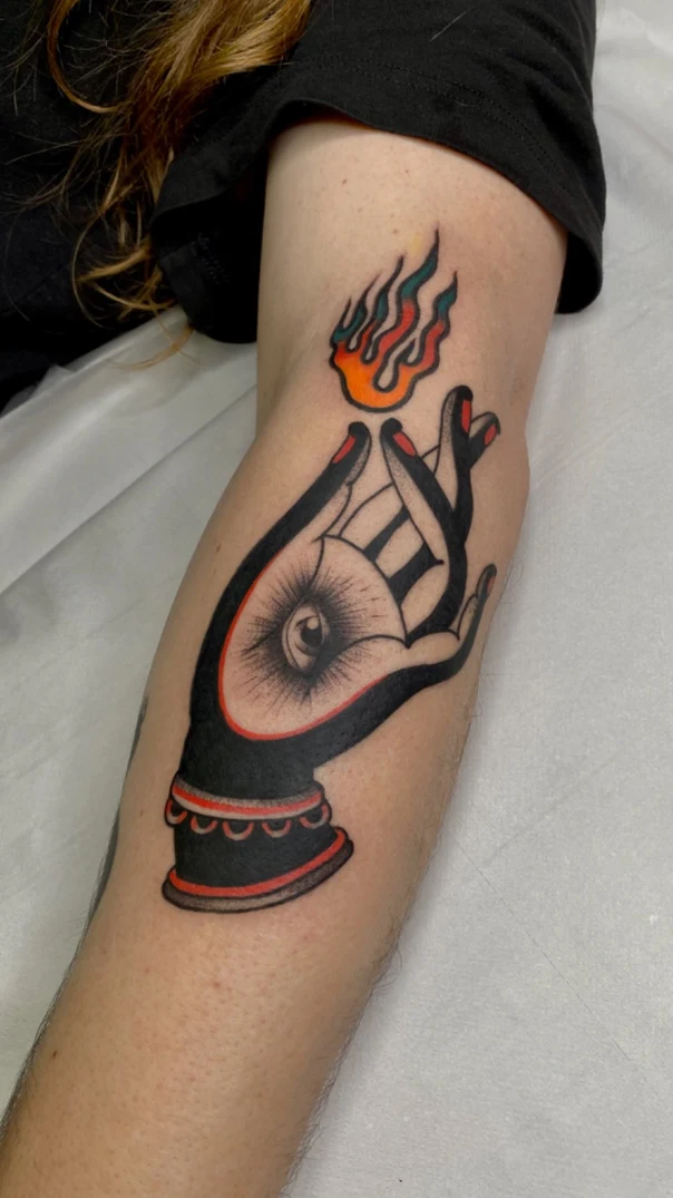Traditional Hand, Eye tattoo on Forearm