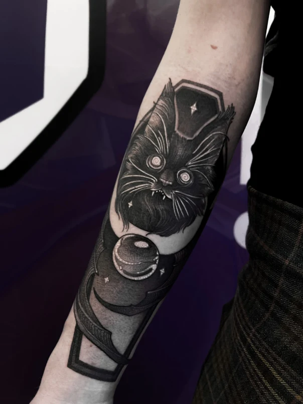 Blackwork Cat, Crystal ball tattoo on Forearm