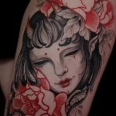 Japanese Woman, Flowers tattoo on Upper Arm