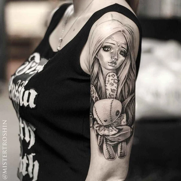 Black & Grey Doll, Bunny tattoo on Upper Arm