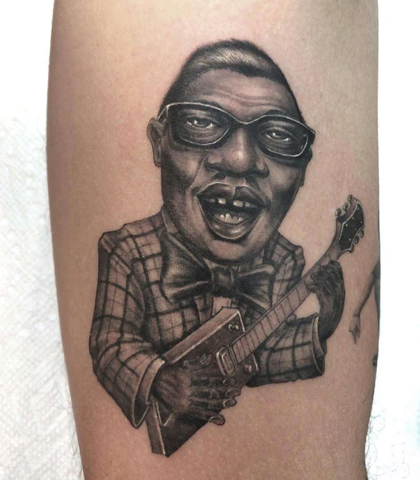 Realism Portrait, Guitar tattoo on Forearm
