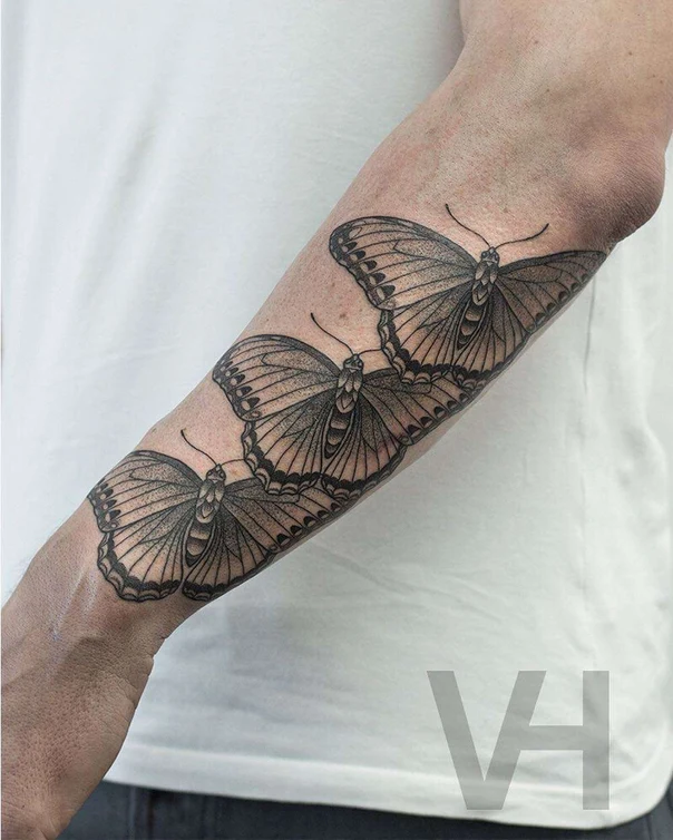 Linework Butterfly tattoo on Forearm