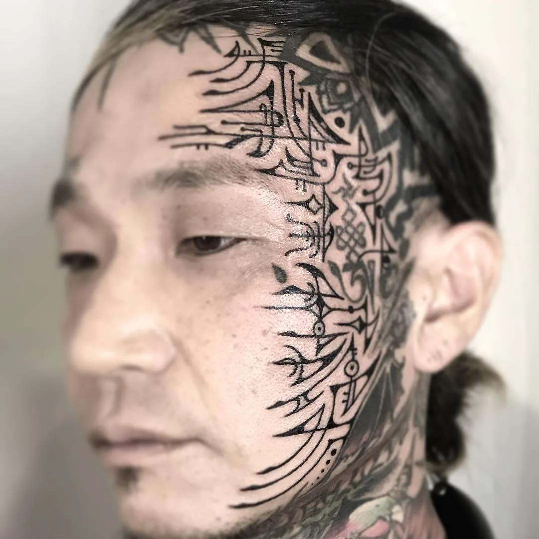 Tattoo artist Jondix, authors style black ornamental tattoo | United Kingdom