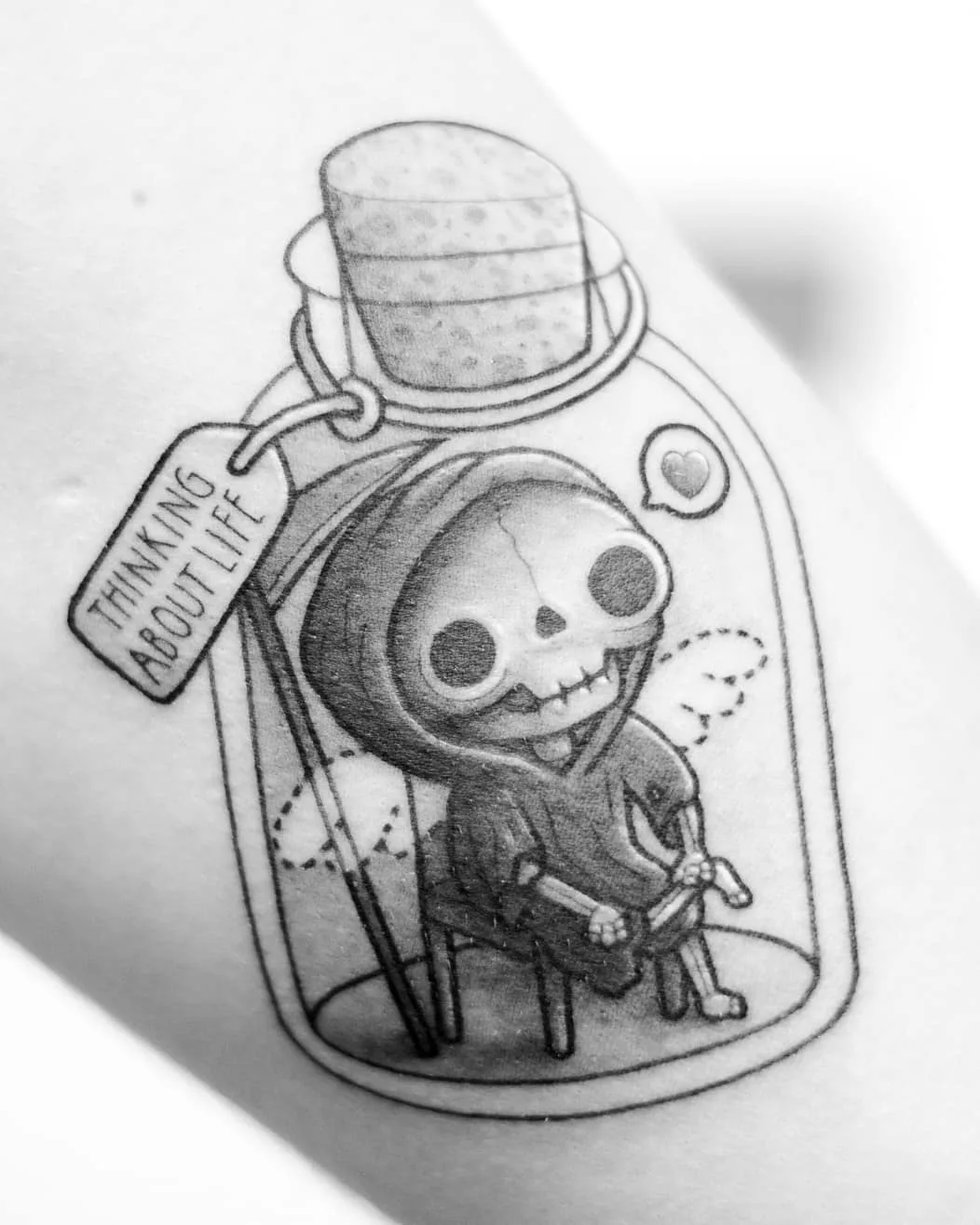 Tattoo artist Perou, author's black-and-grey cartoon tattoo | Sion, SSwitzerland