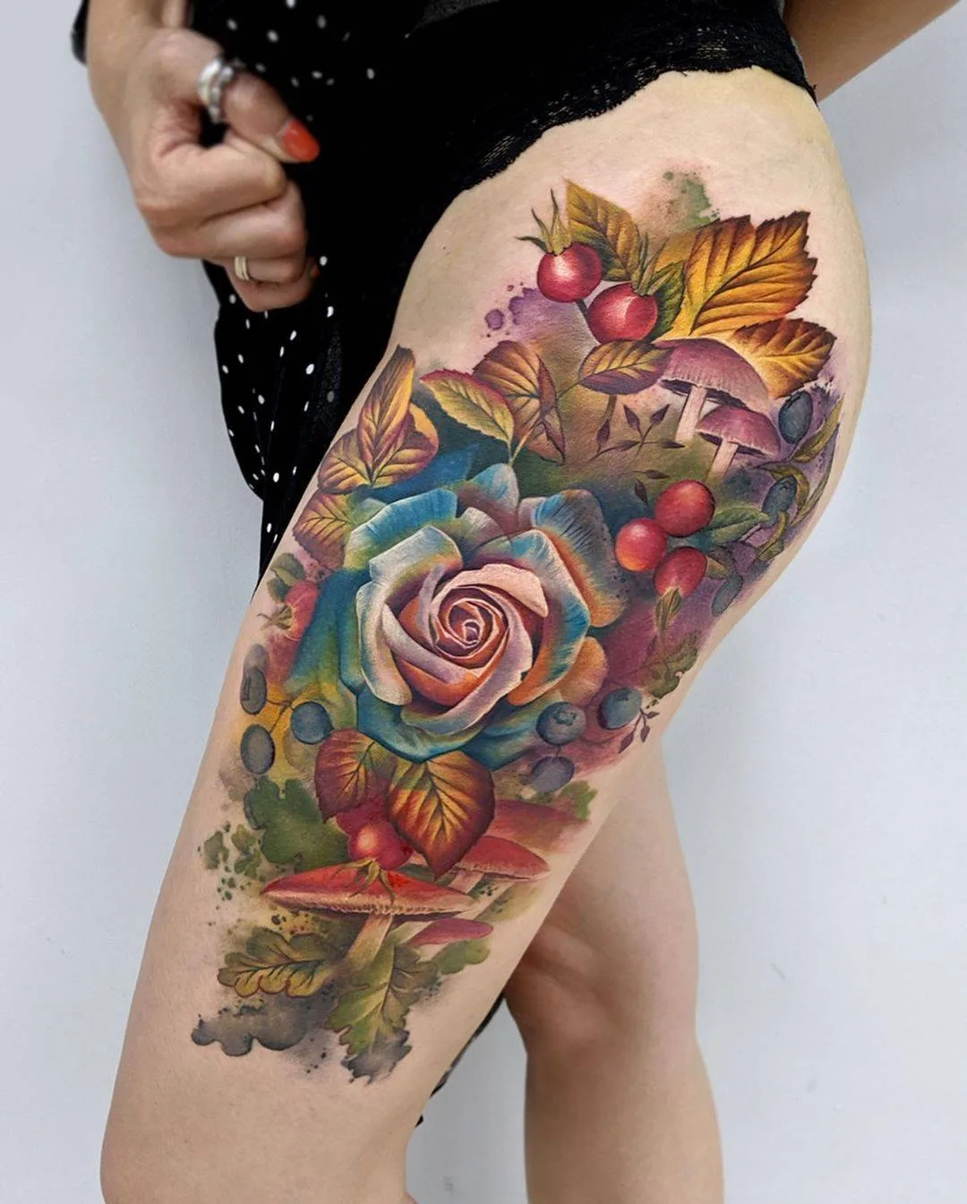 Tattoo artist Lianne Moule, color watercolor flowers tattoo | United Kingdom