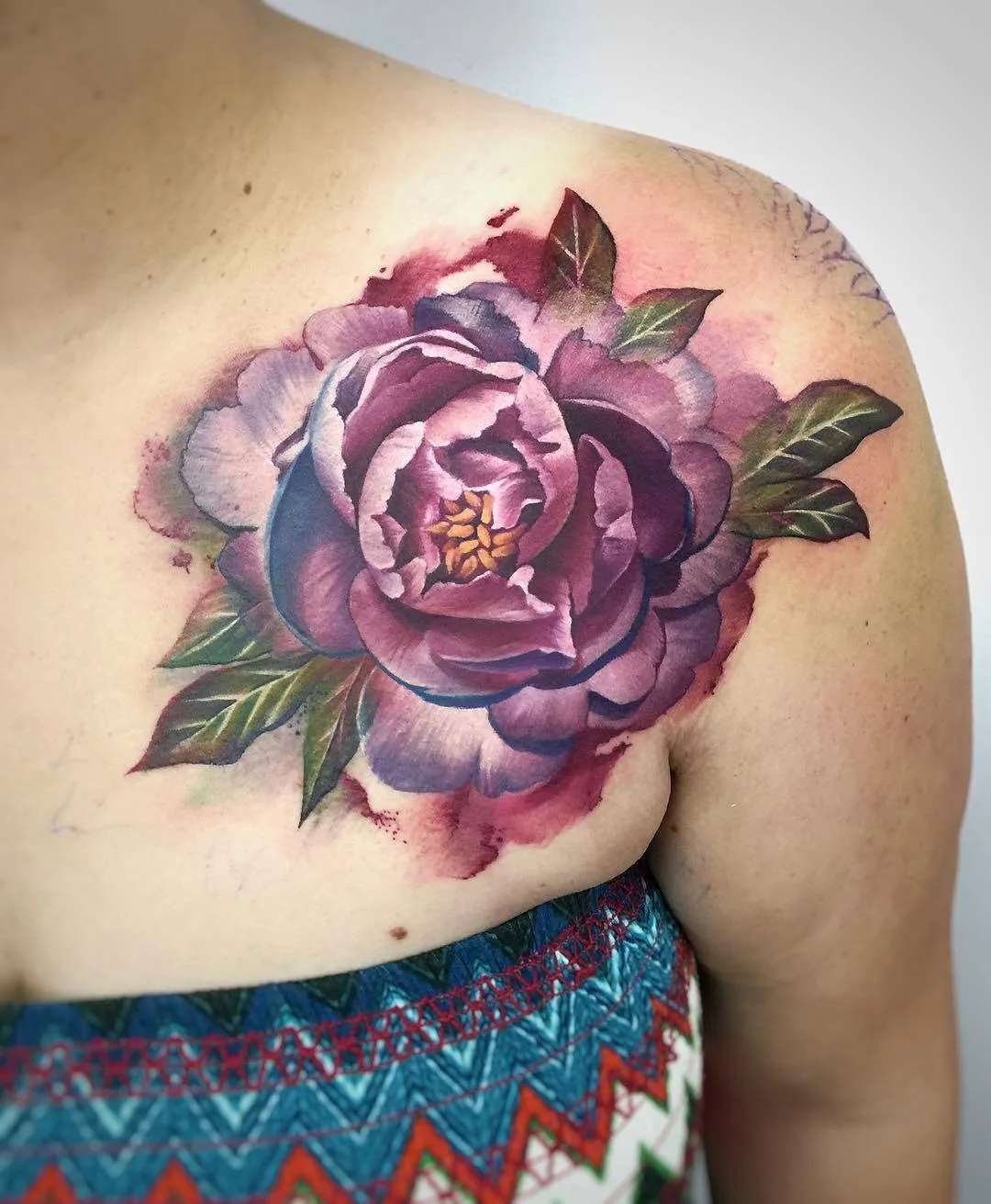 Tattoo artist Lianne Moule, color watercolor flowers tattoo | United Kingdom