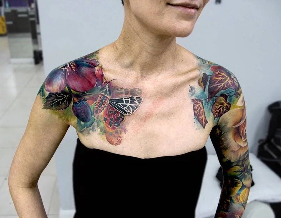 Tattoo artist Lianne Moule, color watercolor flowers tattoo | United Kingdom