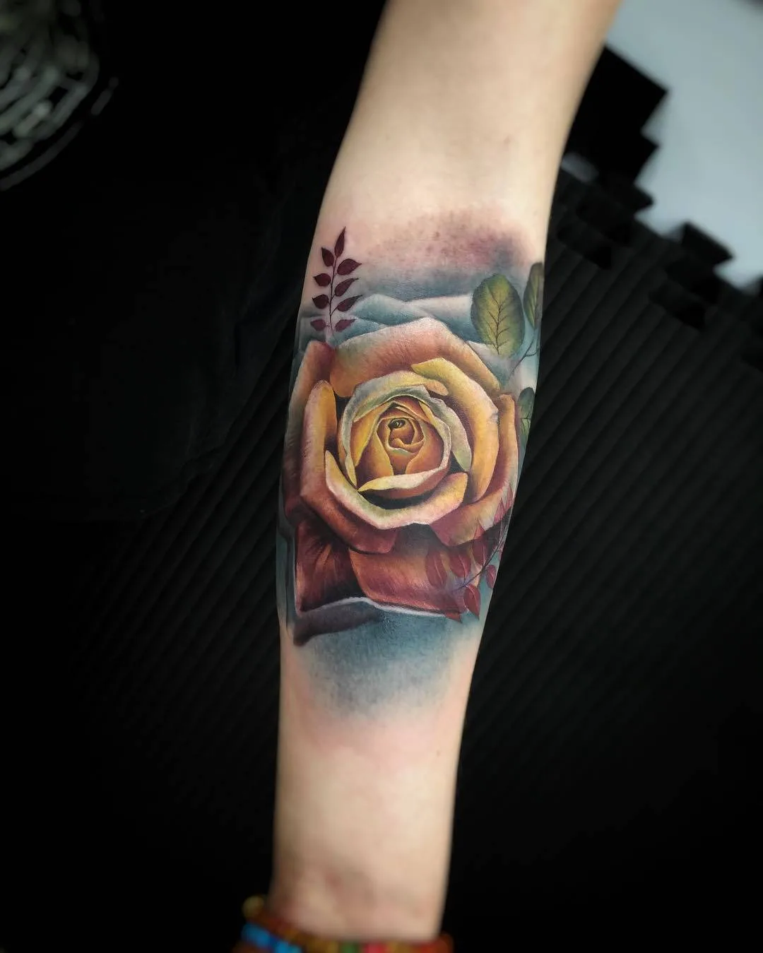 Tattoo artist Lianne Moule, color watercolor flowers tattoo | United Kingdom