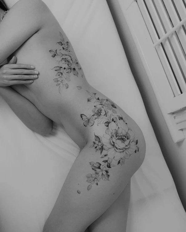 Fineline Flowers, Butterfly tattoo on Hip