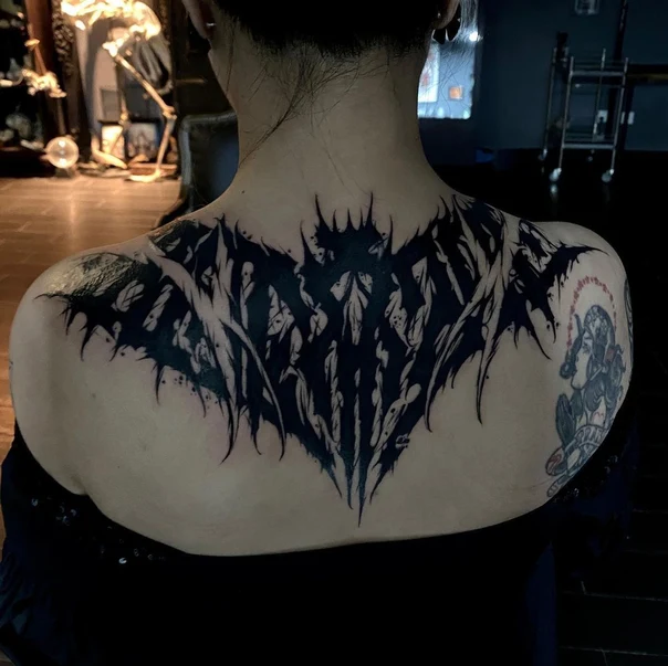 Blackwork Abstract tattoo on Upper Back