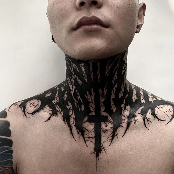 Blackwork Cross tattoo on Neck