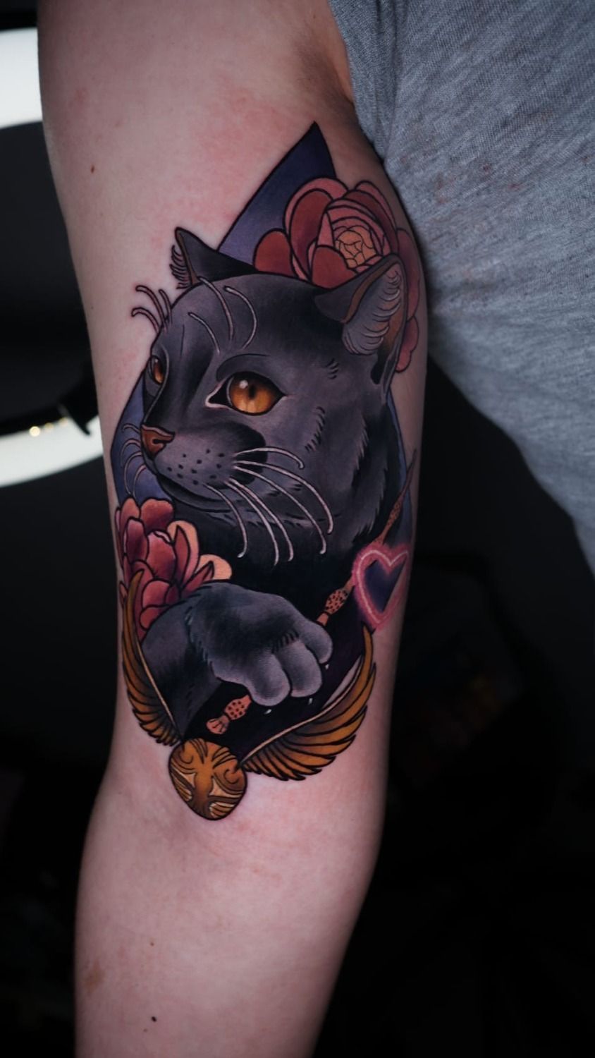 Женская татуировка с котом