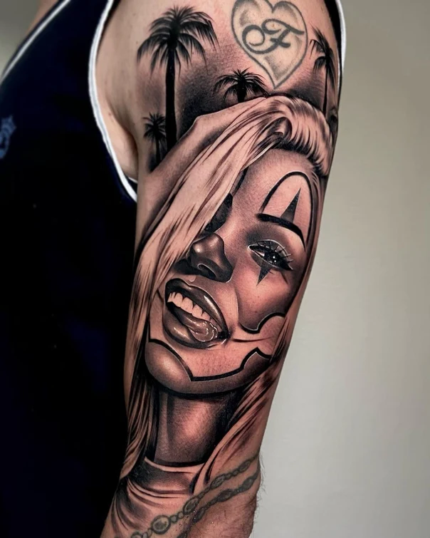Black & Grey Clown, Palm trees tattoo on Upper Arm