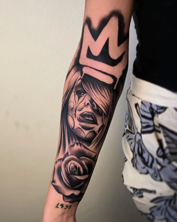 Black & Grey Face, Rose tattoo on Forearm
