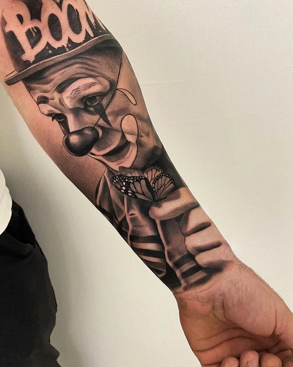 Realism Clown, Butterfly tattoo on Forearm