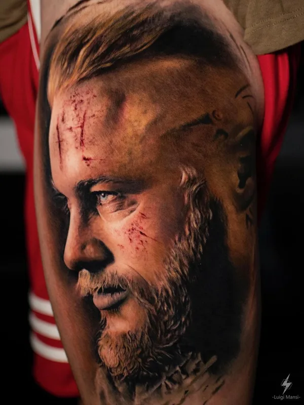 male color realism tatuaje en upper arm #41425 | Tatuador Luigi Mansi