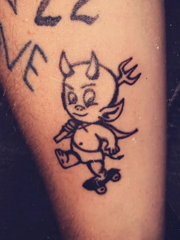 black cartoon tattoo auf forearm #41441 | Tätowierer Salem Schaar