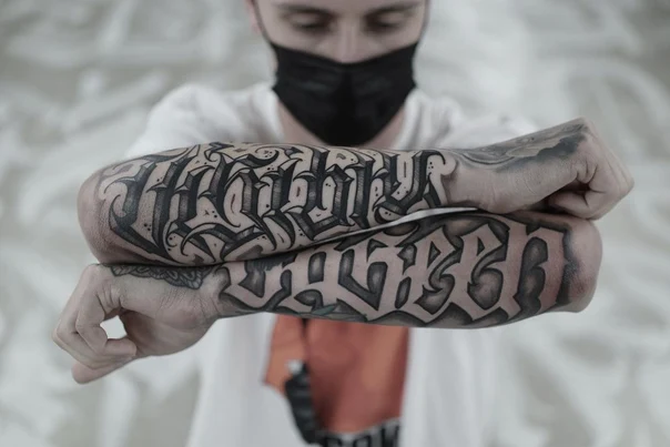 Lettering Lettering tattoo on Forearm