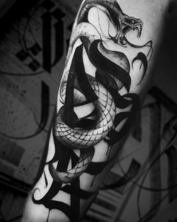 Blackwork Snake, Lettering tattoo on Forearm