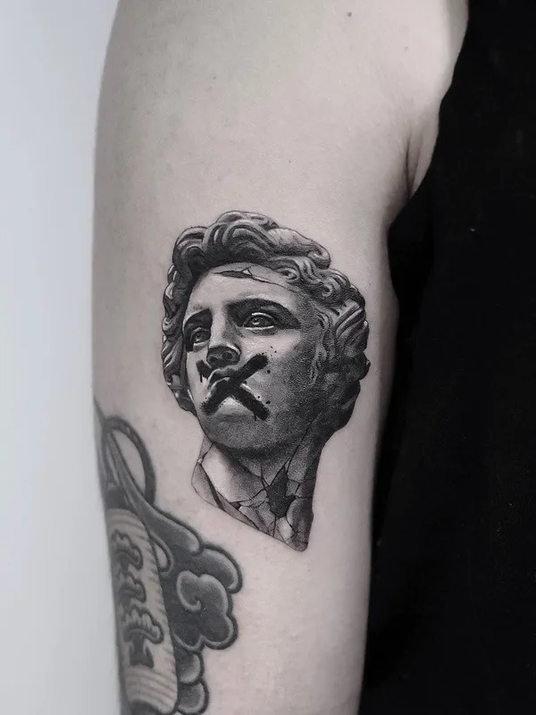 black and grey realism tattoo on upper arm #55858 | Tattoo Artist Dani Sanz