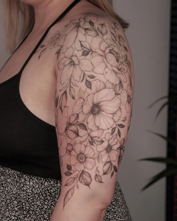 Fineline Flowers, Leaves tattoo on Upper Arm