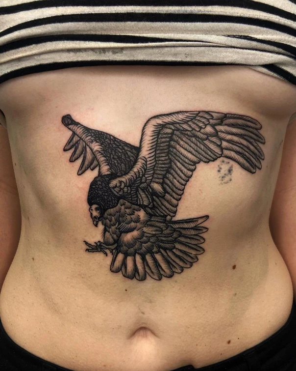 Blackwork Bird tattoo on Stomach