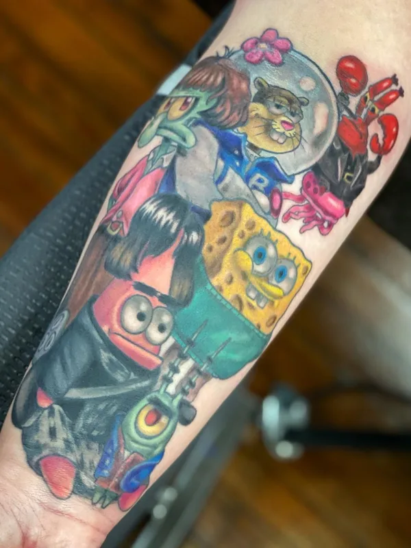 color cartoon Tatuaggio su forearm #56551 | Tatuatore Lindsay Hall